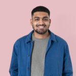 Home indian man smiling cheerful expression closeup portrait